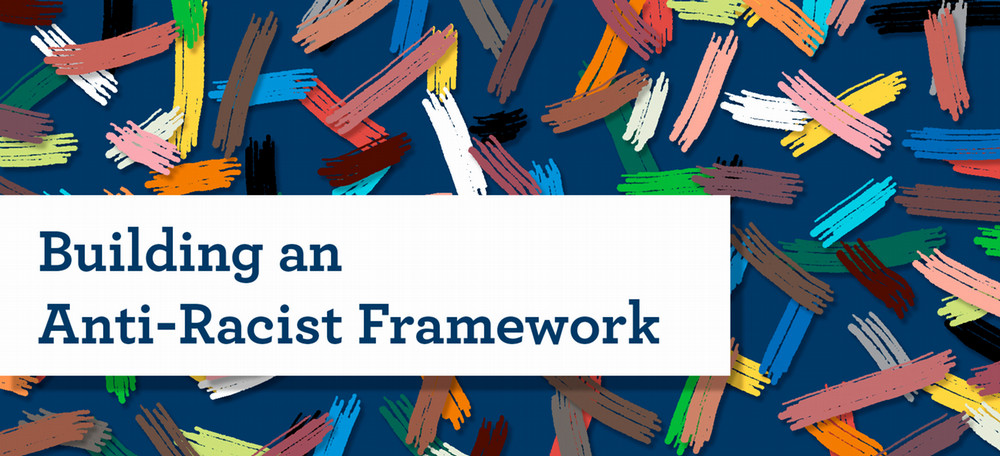 "Building an Anti-Racist Framework" on top of multi-colored painting