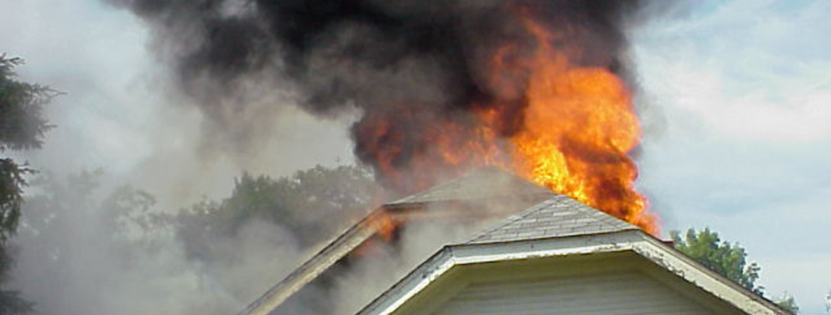 Roof of house on fire