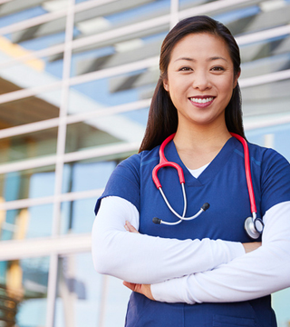 smiling healthcare worker wearing scrubs