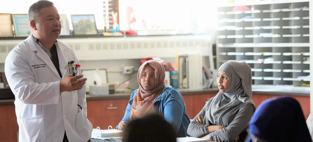 Instructor and students in a classroom