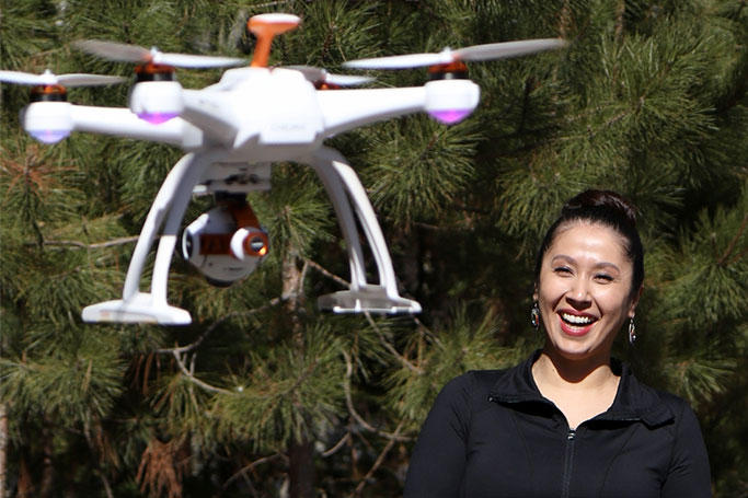 Student flying a drone