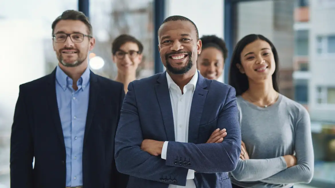 Group of employees directly facing camera